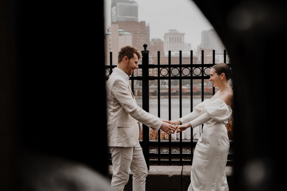 Bride and groom walking together in the city